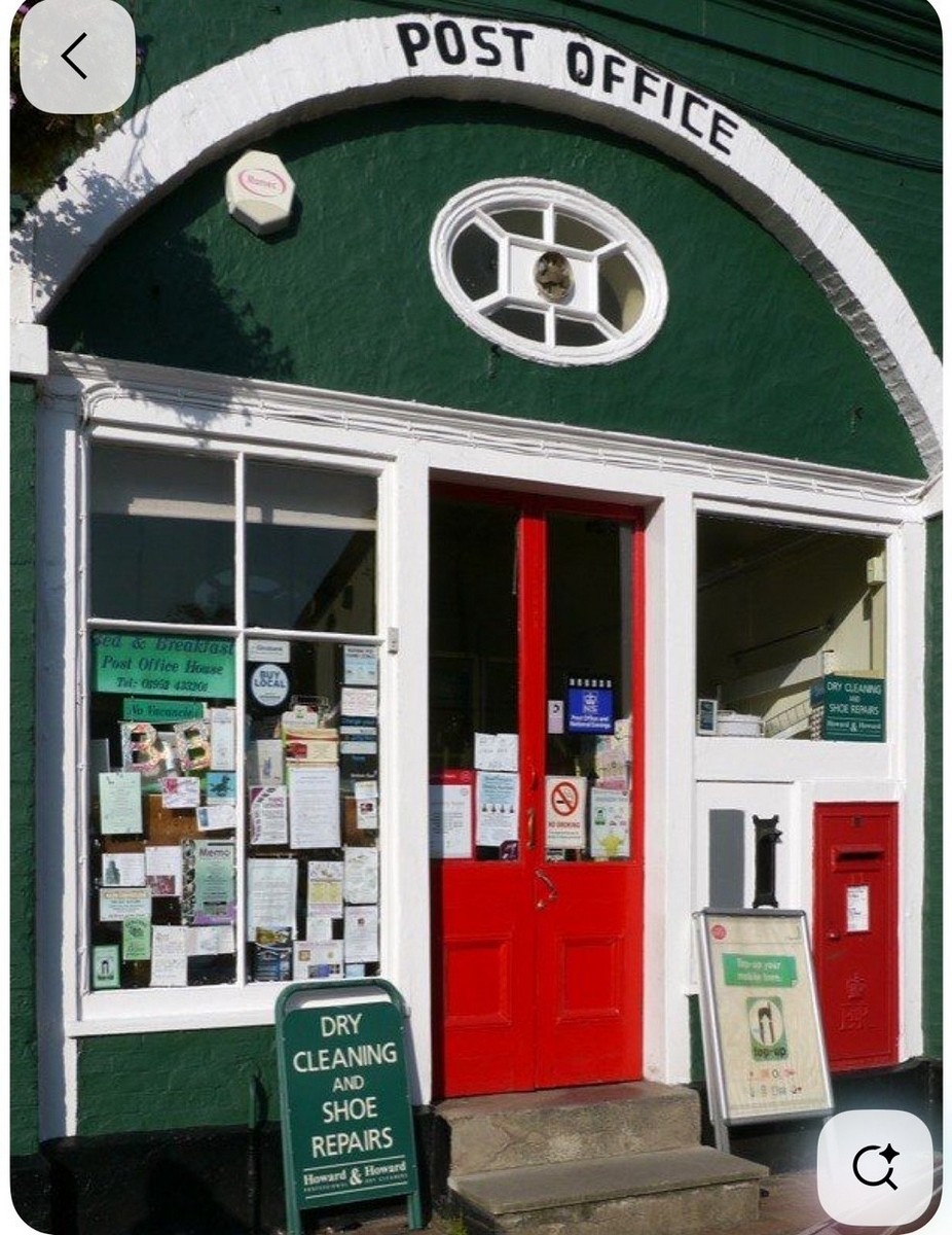 The Post Office arch in its green livery, the oval window sitting neatly above the doors. That oval is original market fabric, not a later flourish, and it survives above the shopfront today. For decades this arch was where the Gorge collected its pensions and posted its letters. Exact date unknown.