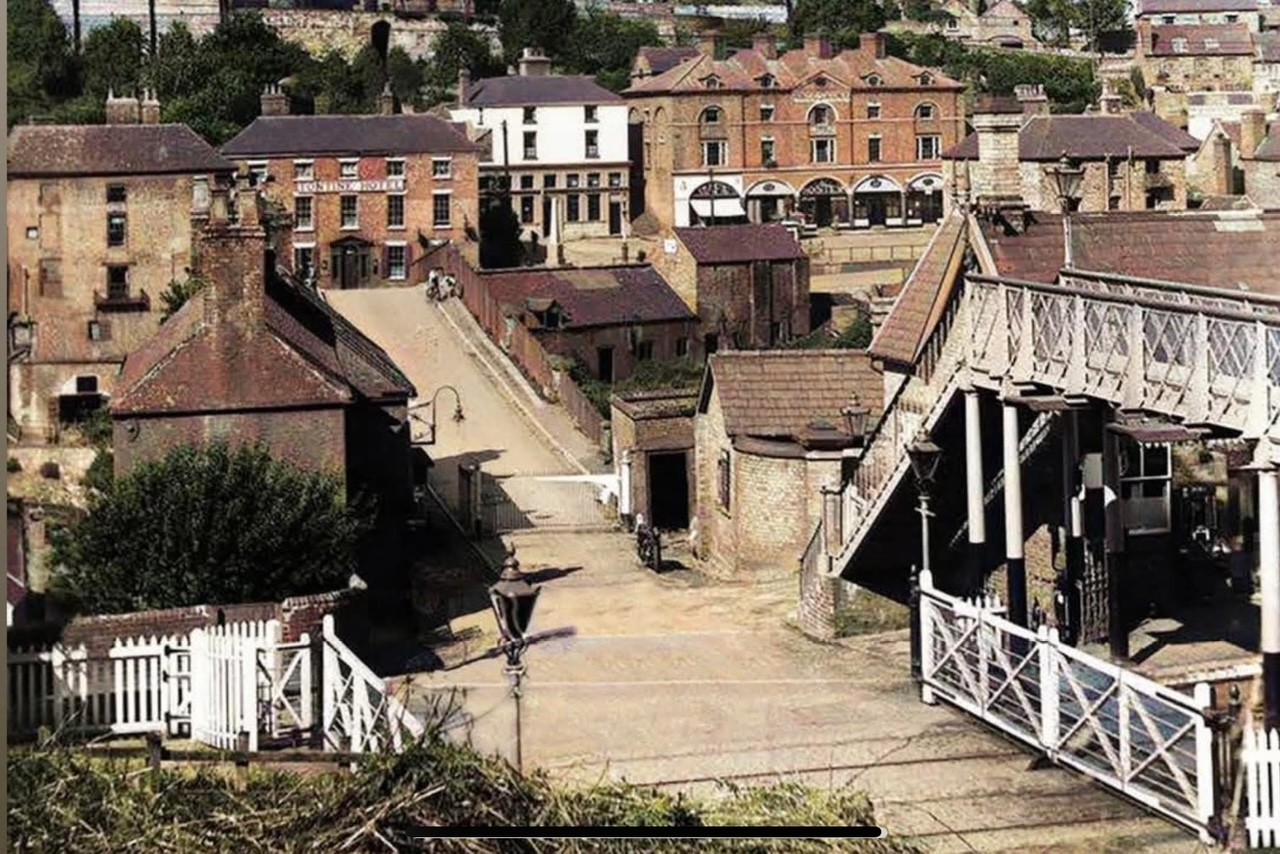 Looking down on the Tontine Hotel, the level crossing and the streets below