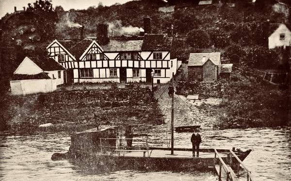 Ferry boat before the timber-framed cottages