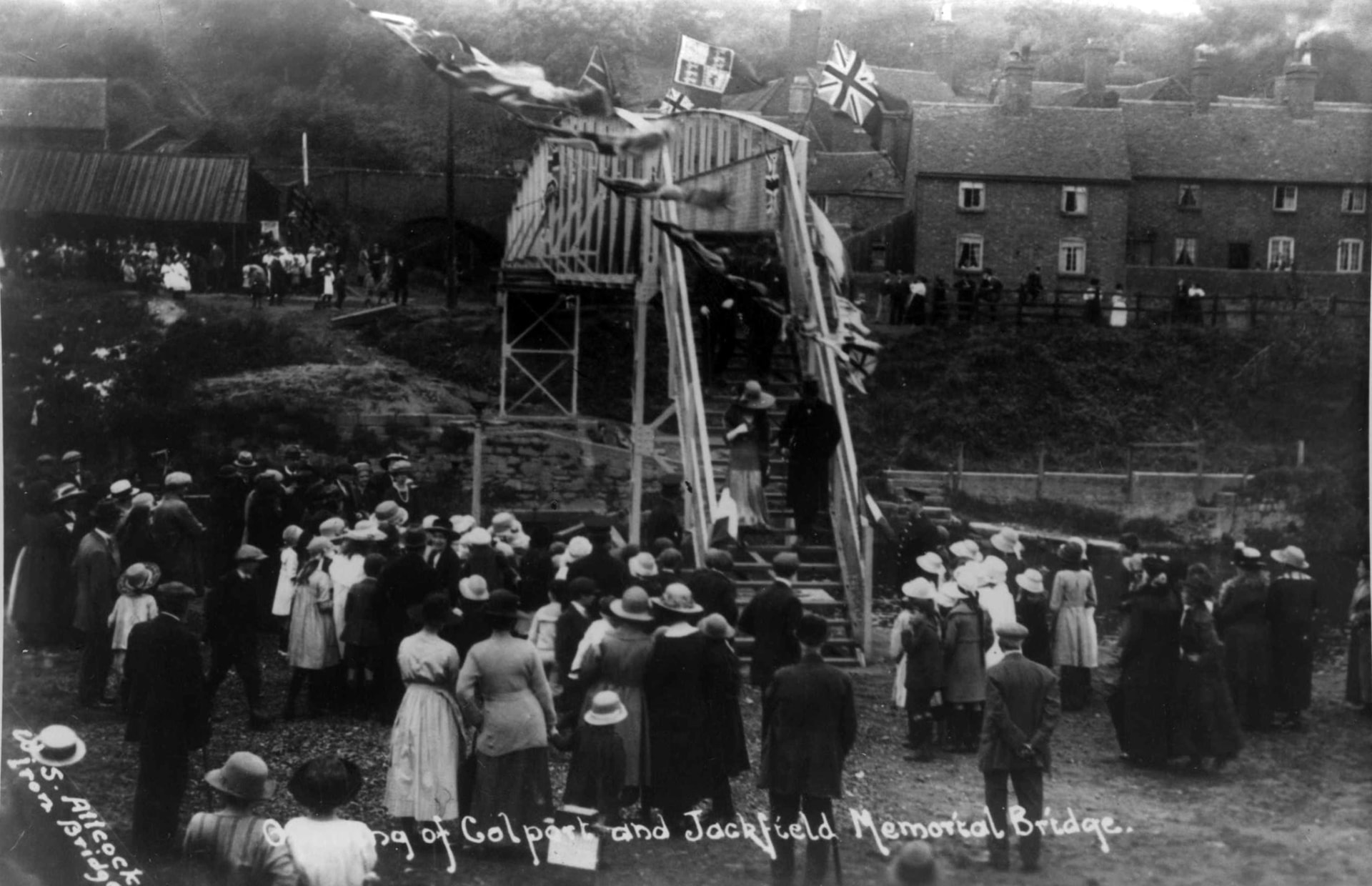 The opening ceremony from the Jackfield side, the steps and platform dressed with flags. Photograph by S. Allcock, Iron-Bridge.