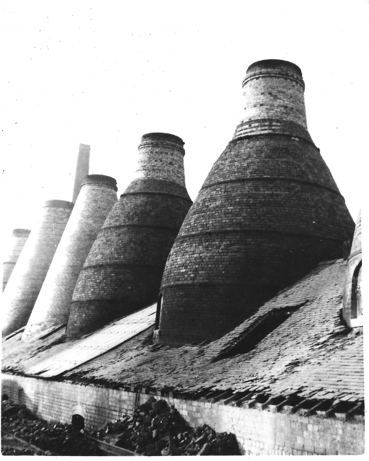 The bottle kilns at Maws, rising above the works roofs