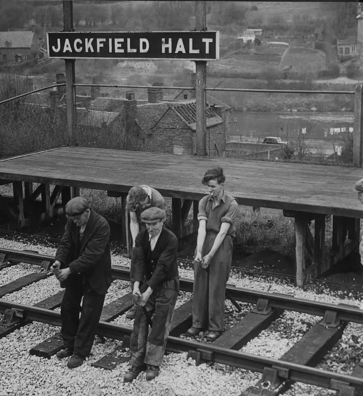 Workers forcing the shifting railway track back towards alignment at Jackfield Halt, April 1952. Picture Post reported movement of around six inches a day.