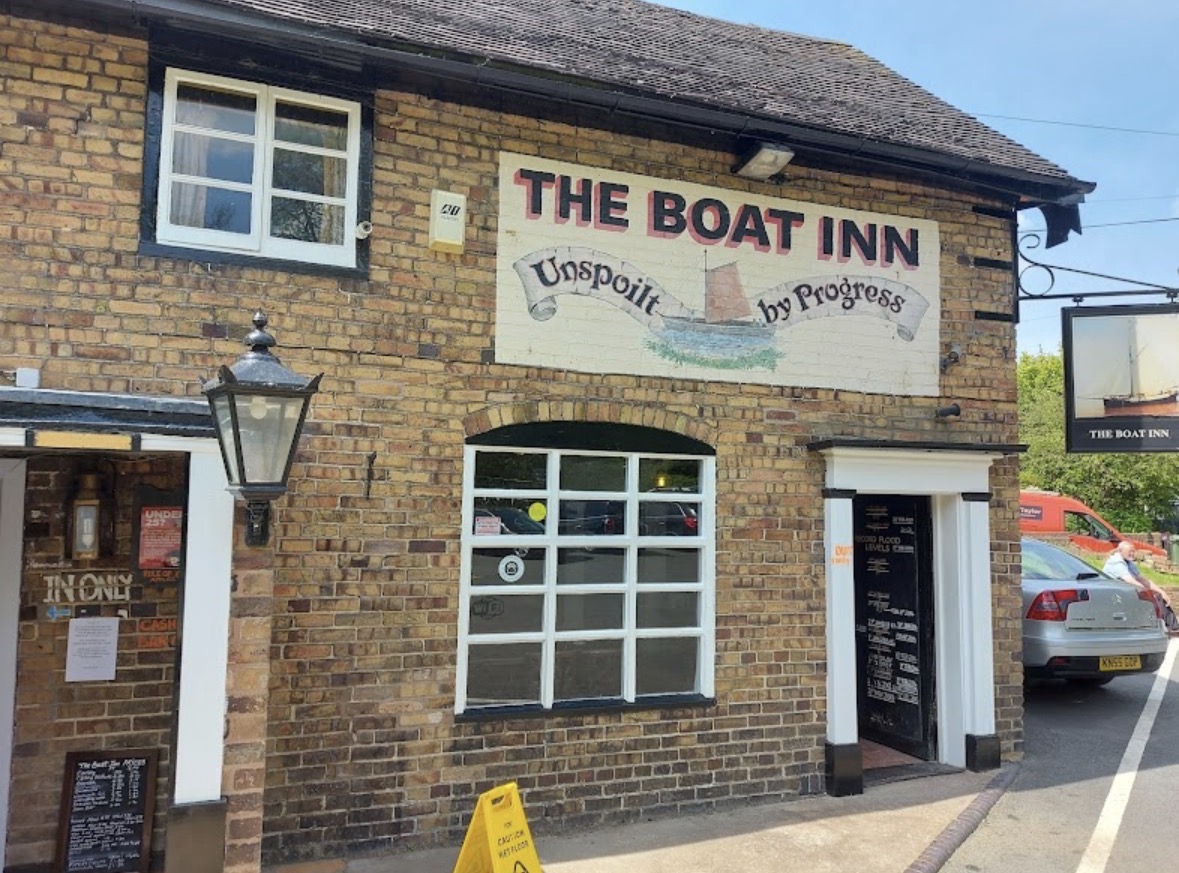 The Boat Inn today — “Unspoilt by Progress”, as the painted wall sign proudly puts it.
