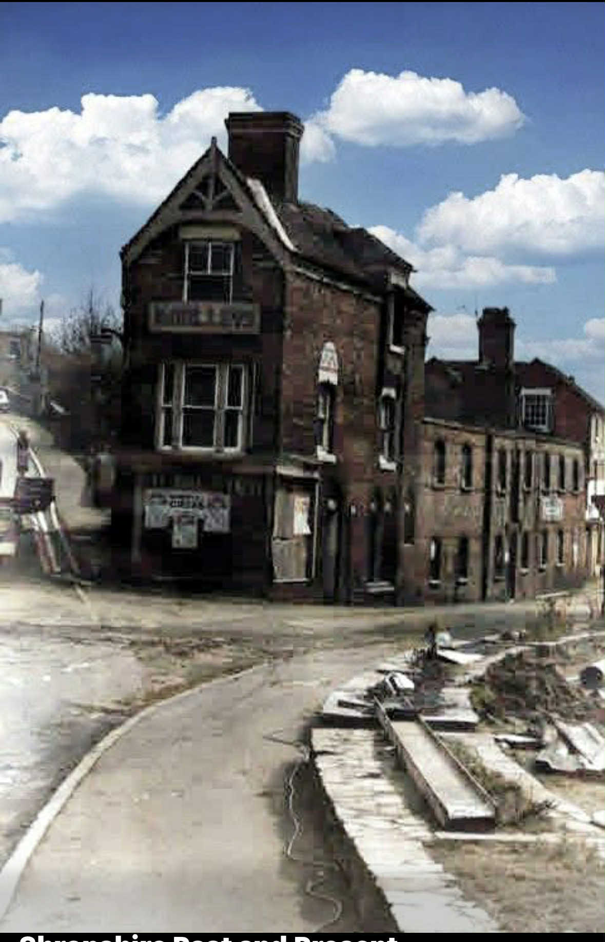 The corner building and its adjoining shops, with the road being worked on in front