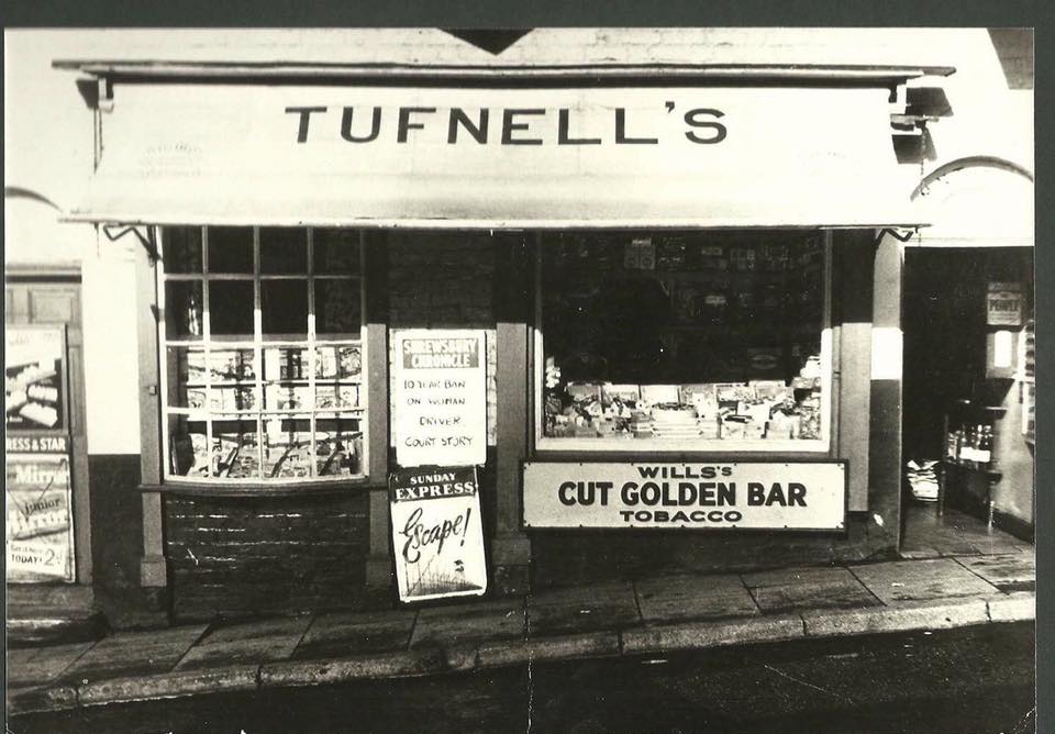The Tufnell's shopfront, its Wills's Cut Golden Bar sign across the window