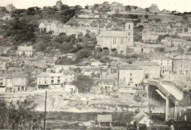 The cleared ground beside the Iron Bridge, the hillside rising behind