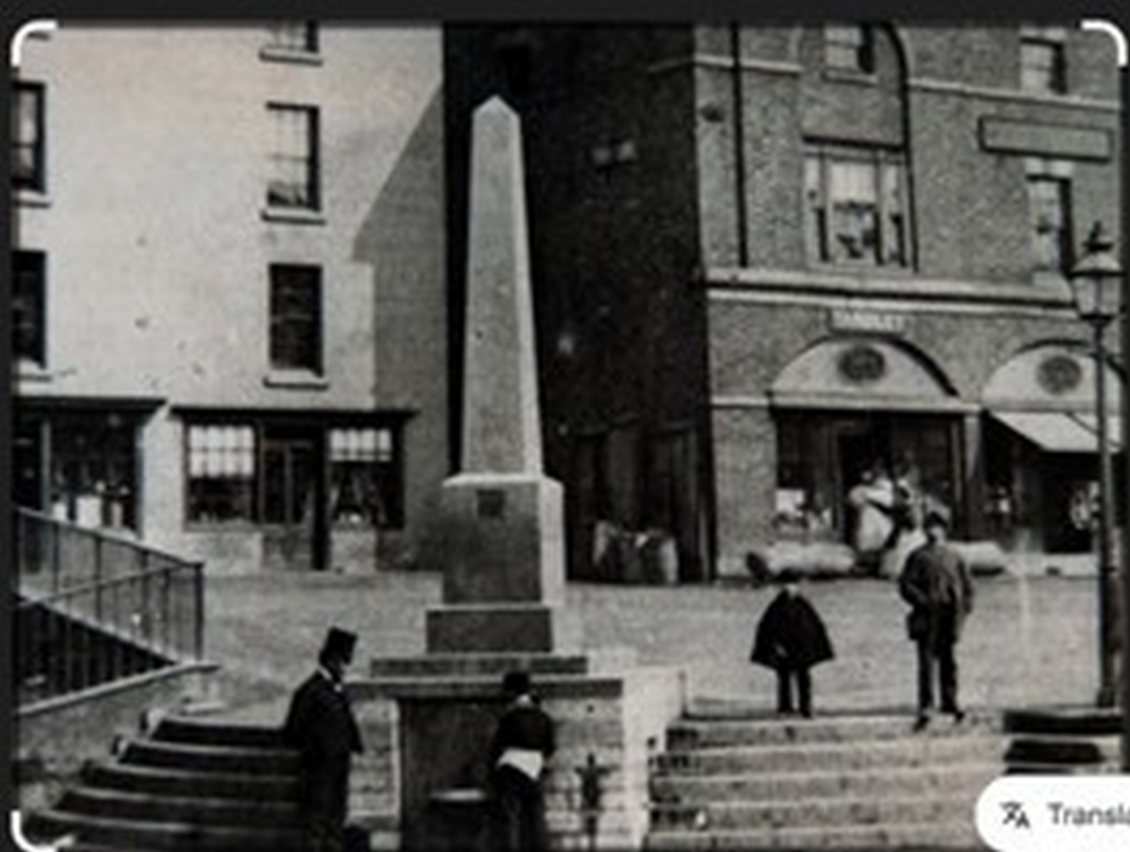 The Bartlett memorial obelisk raised on its steps at the front of the Square. It was built to give people clean drinking water at a time when that was far from guaranteed in the Gorge — a memorial that did a job as well as marking a name. Exact date unknown.